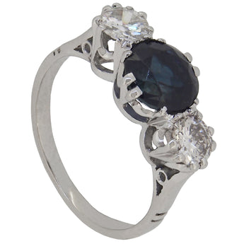 An early 20th century, platinum, sapphire & diamond set three stone ring.