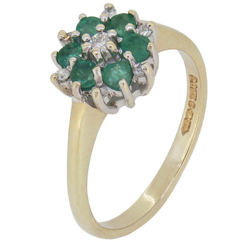 A modern, 9ct yellow gold, emerald & diamond set cluster ring.