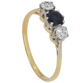 An early 20th century, 18ct yellow gold, sapphire & diamond set three stone ring