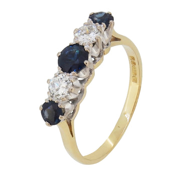 A modern, 18ct yellow gold, sapphire & diamond set, five stone half hoop ring