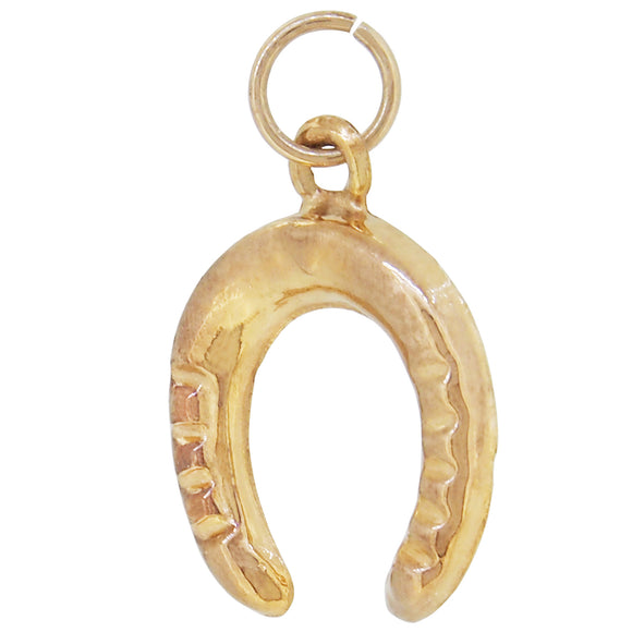 A modern, 9ct yellow gold horseshoe charm