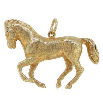 A modern, 14ct yellow gold horse pendant.