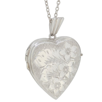 A mid-20th century, silver, engraved, heart shaped locket & chain.