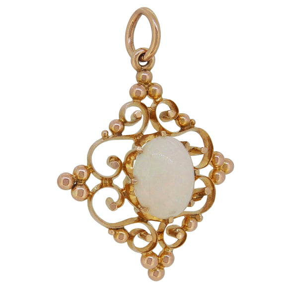 A mid-20th century, 9ct yellow gold, opal set pendant