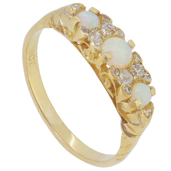 An Edwardian, 18ct yellow gold, opal & diamond set carved half hoop ring.