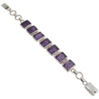 A white metal (marked 800), cabochon amethyst set, seven stone bracelets.