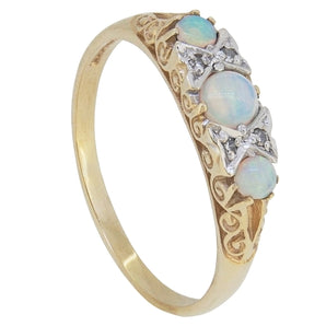 A modern, 9ct yellow gold, opal & diamond set carved half hoop ring.