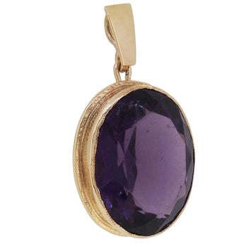A modern, 9ct yellow gold, amethyst set pendant.