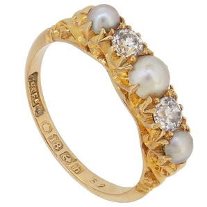 An Edwardian, 18ct yellow gold, pearl & diamond set, five stone, carved half hoop ring.