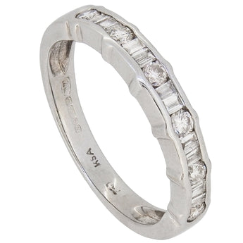 A modern, 18ct white gold, brilliant & baguette cut diamond set half eternity ring.