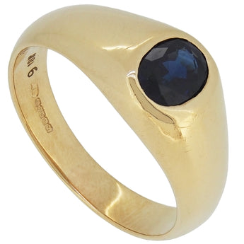 A modern, 14ct yellow gold, sapphire set single stone ring.