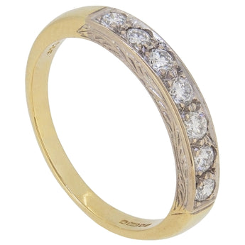 An early 20th century, 18ct yellow gold, diamond set, seven stone half eternity ring.