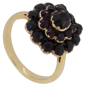 An early 20th century, 9ct yellow gold, garnet set cluster ring.