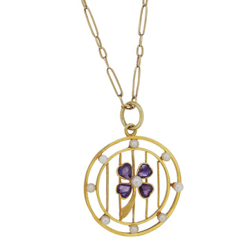 An Edwardian, 9ct yellow gold, amethyst & pearl set circular pendant & chain.