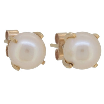 A pair of early 20th century, 9ct yellow gold, pearl set stud earrings.