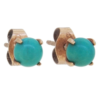 A pair of modern, 9ct yellow gold, turquoise set stud earrings.