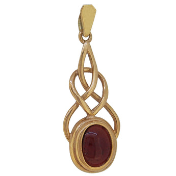 A modern, 9ct yellow gold, garnet set pendant.