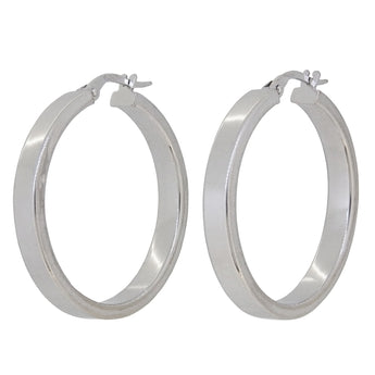 A pair of modern, 9ct white gold hoop earrings.