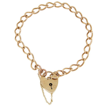 A modern, 9ct yellow gold, curb link bracelet with a padlock clasp.