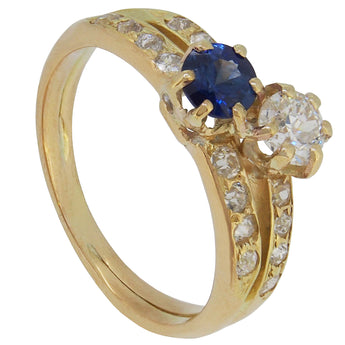 A Edwardian, 18ct yellow gold, sapphire & diamond set crossover ring.