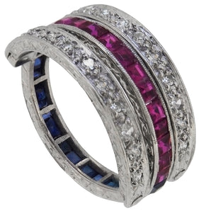 A mid-20th century, platinum, ruby, sapphire & diamond set reversible ring.