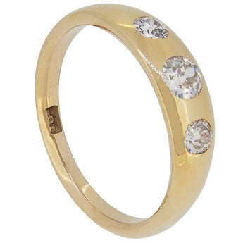 An Edwardian, 18ct yellow gold, diamond set, three stone Gypsy set ring.