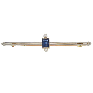 An early 20th century, platinum, sapphire & pearl set bar brooch with a 15ct yellow gold pin