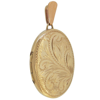 A modern, 9ct yellow gold, engraved oval locket.