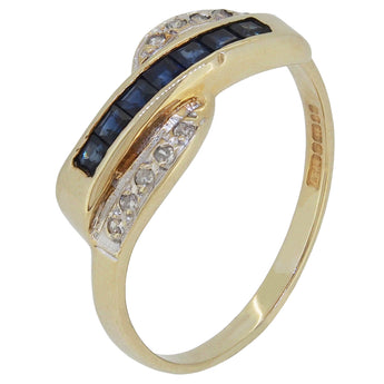 A modern, 9ct yellow gold, sapphire & diamond set, three row crossover ring.