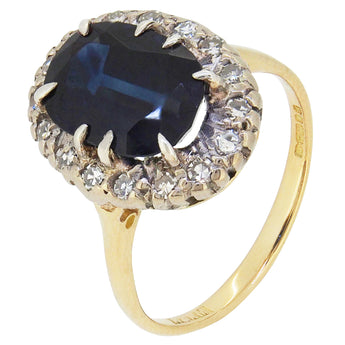 A modern, 18ct yellow gold, sapphire & diamond set cluster ring.