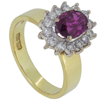 A modern, 9ct yellow gold, ruby & diamond set cluster ring.