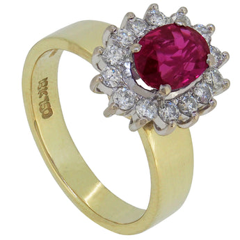 A modern, 9ct yellow gold, ruby & diamond set cluster ring.