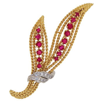 A mid-20th century, yellow metal, ruby & diamond set spray brooch.