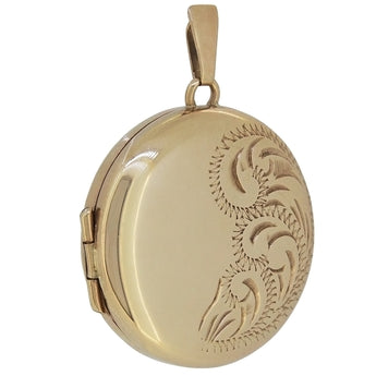 A modern, 9ct yellow gold, circular, half engraved locket.