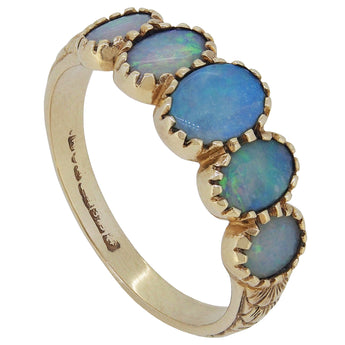 A mid-20th century, 9ct yellow gold, opal set, five stone half hoop ring.