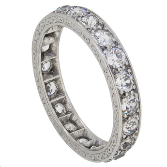 An early 20th century, platinum, diamond set eternity ring.