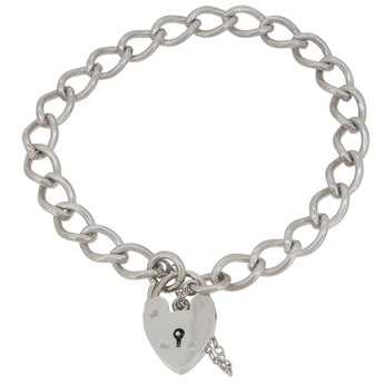 A mid-20th century, silver, curb link bracelet with a padlock clasp.