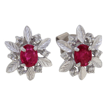 A pair of modern, 9ct white gold, ruby & diamond set stud earrings.
