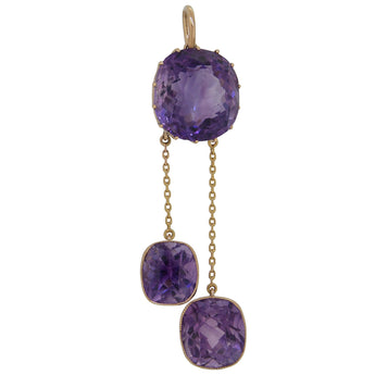 An Edwardian, 15ct yellow gold, amethyst set, three stone pendant.