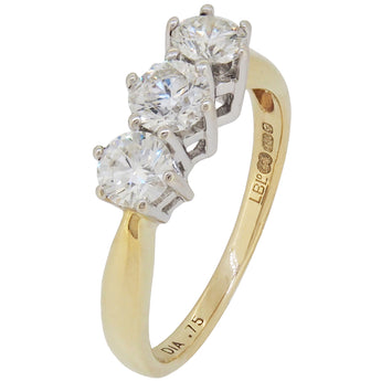 An 18ct yellow & white gold, diamond set three stone ring.