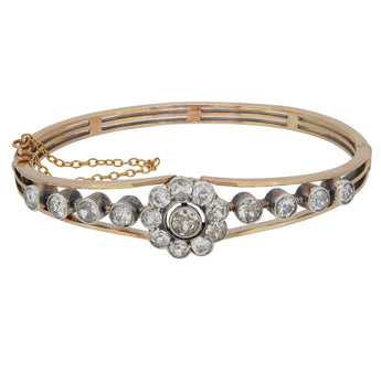 A Victorian, yellow gold, diamond set, open work, hinged bangle.