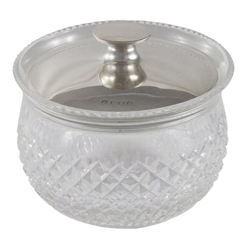 An early 20th century, glass, circular dish with a silver lid.