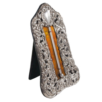 A Victorian, silver faced thermometer on a stand