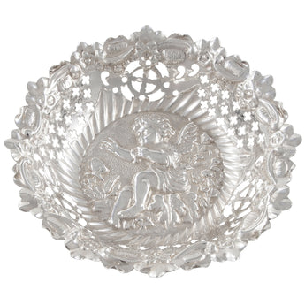 A Victorian, silver, pierced, circular bon bon dish embossed with a cherub motive in the centre of the bowl.