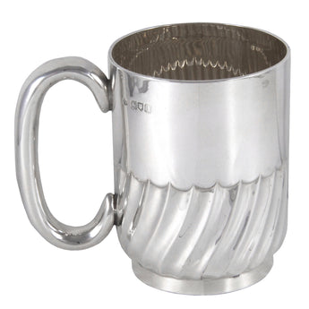 An Edwardian, silver, one pint tankard with spiral fluted decoration to the lower body & a loop handle.
