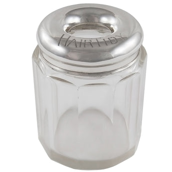 An Edwardian, glass hair tidy with a silver top, engraved with HAIR TIDY.