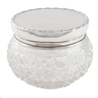 An Edwardian, glass jar with a silver lid
