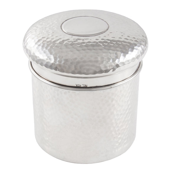 An Edwardian, silver, hammered, circular lidded box