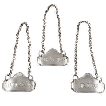 Three Georgian, silver decanter labels for Brandy, Rum & Hollands
