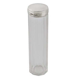 An Edwardian, faceted glass jar with a silver lid.